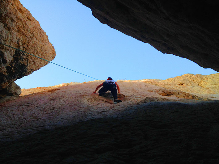 girl climbing rock